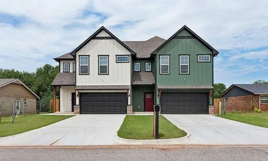 After: finished two-story duplex built by Sanchez Construction